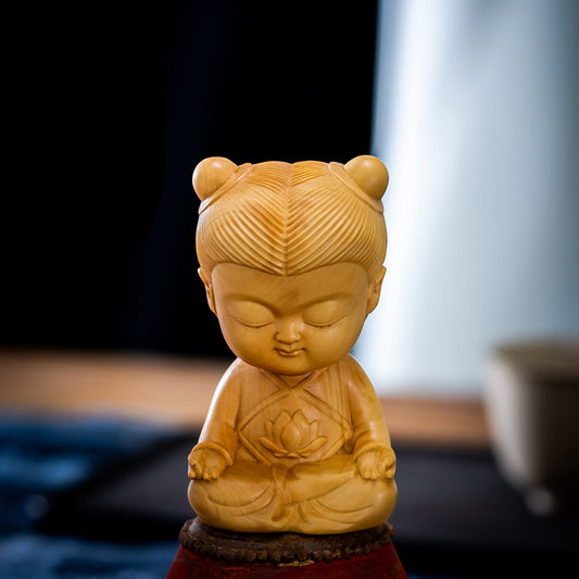 Seated Child Wood Figurine