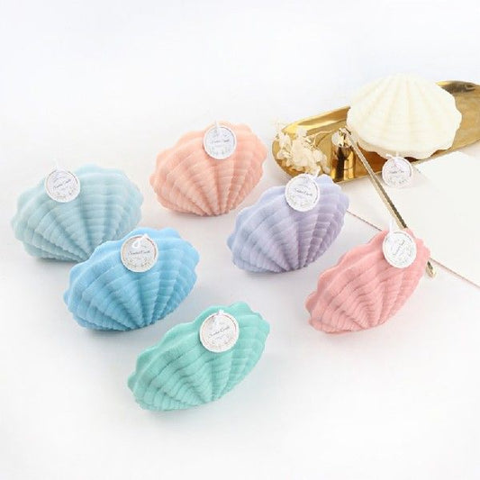 Ribbed Seashell Silicone Candle Mold. Finished candle examples may be shown; wax, wicks and candles are not included.